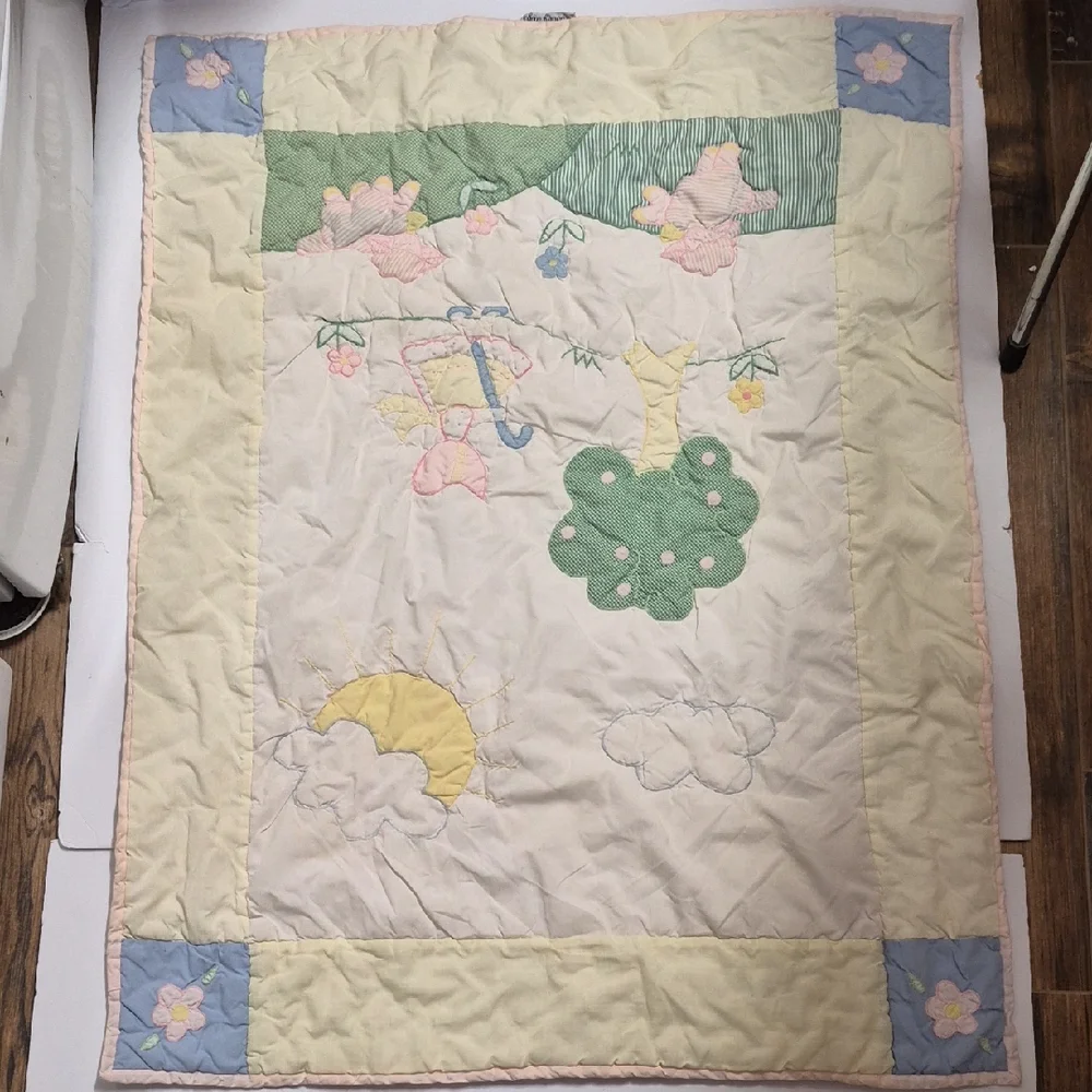 Pastel Embroidered Baby Quilt with Floral Accents